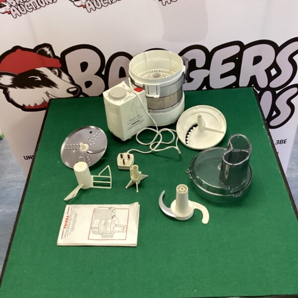 Tefal food processor with various attachments for kitchen use.
