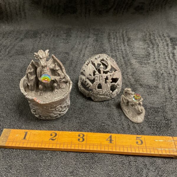 Tudor Mint dragon figurines, a powerful and sleepy dragon pair.