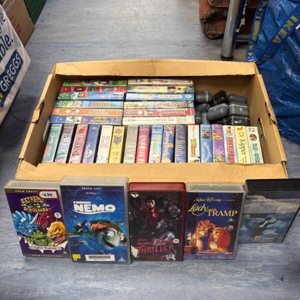 Vintage VHS movie tapes lot for collectors and nostalgic viewing.