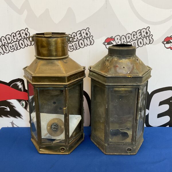 Pair of vintage brass ship lamps with a weathered patina.