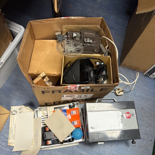 Vintage lot of cine projectors and film editors for collectors.