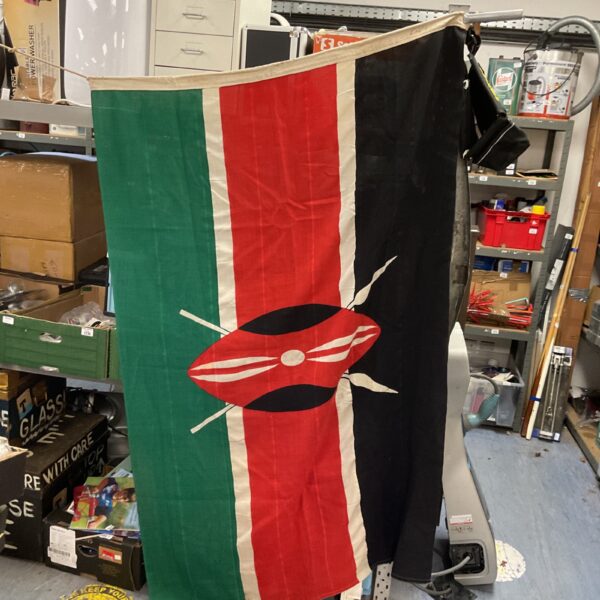 Vintage Kenyan flag with black, red, and green colours.