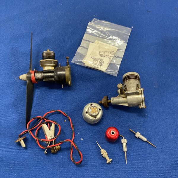 Vintage OS model aircraft engine with propeller, collectible aviation item.