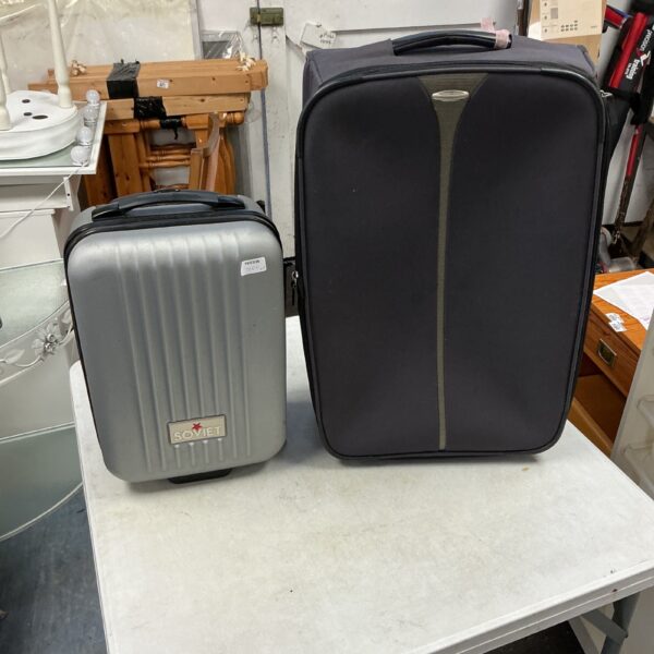 Vintage Soviet and Tripp suitcases, a pair of retro travel cases.