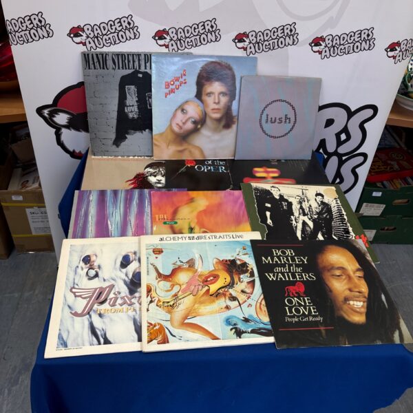 Mixed lot of vinyl records including David Bowie and Bob Marley.