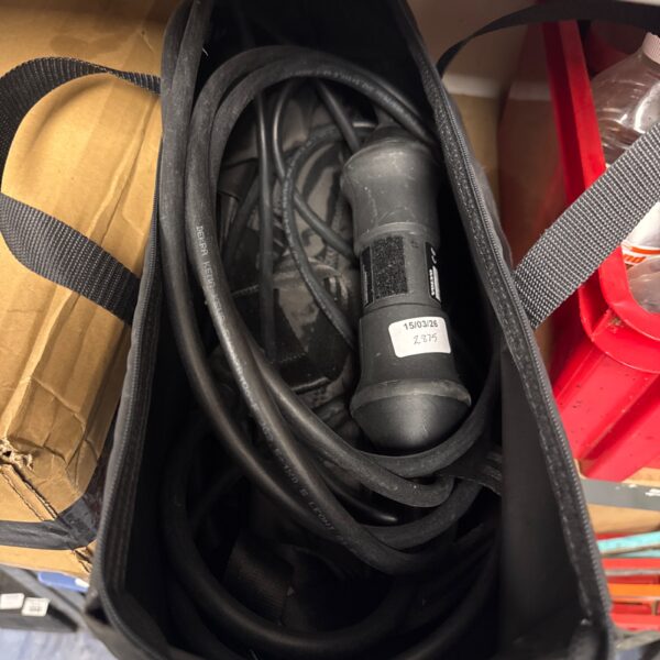 Volvo EV charger cable, 3 pin plug for electric vehicle charging.