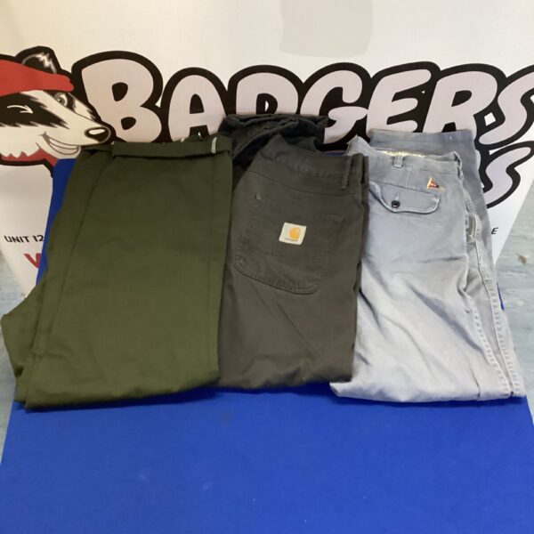 Mixed lot of durable work trousers including Dickies and Carhartt.