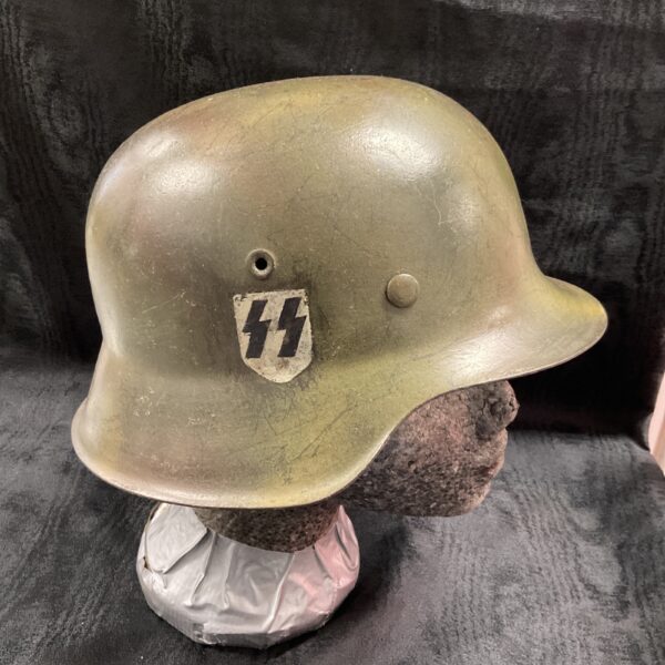 WWII German SS M35 helmet with Waffen SS decal.